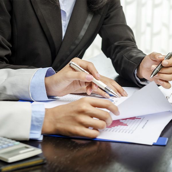 Man and woman completing paperwork