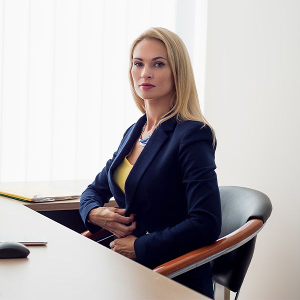woman sitting upright