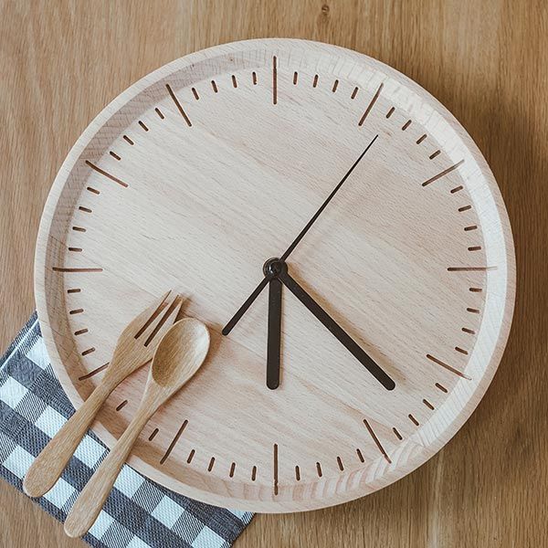 Utensils, napkin and clock