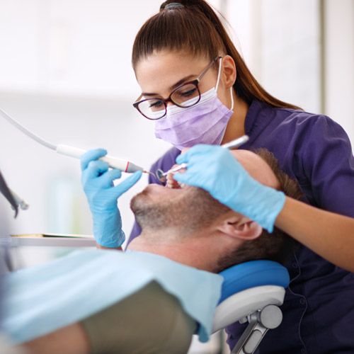 Patient getting a dental cleaning