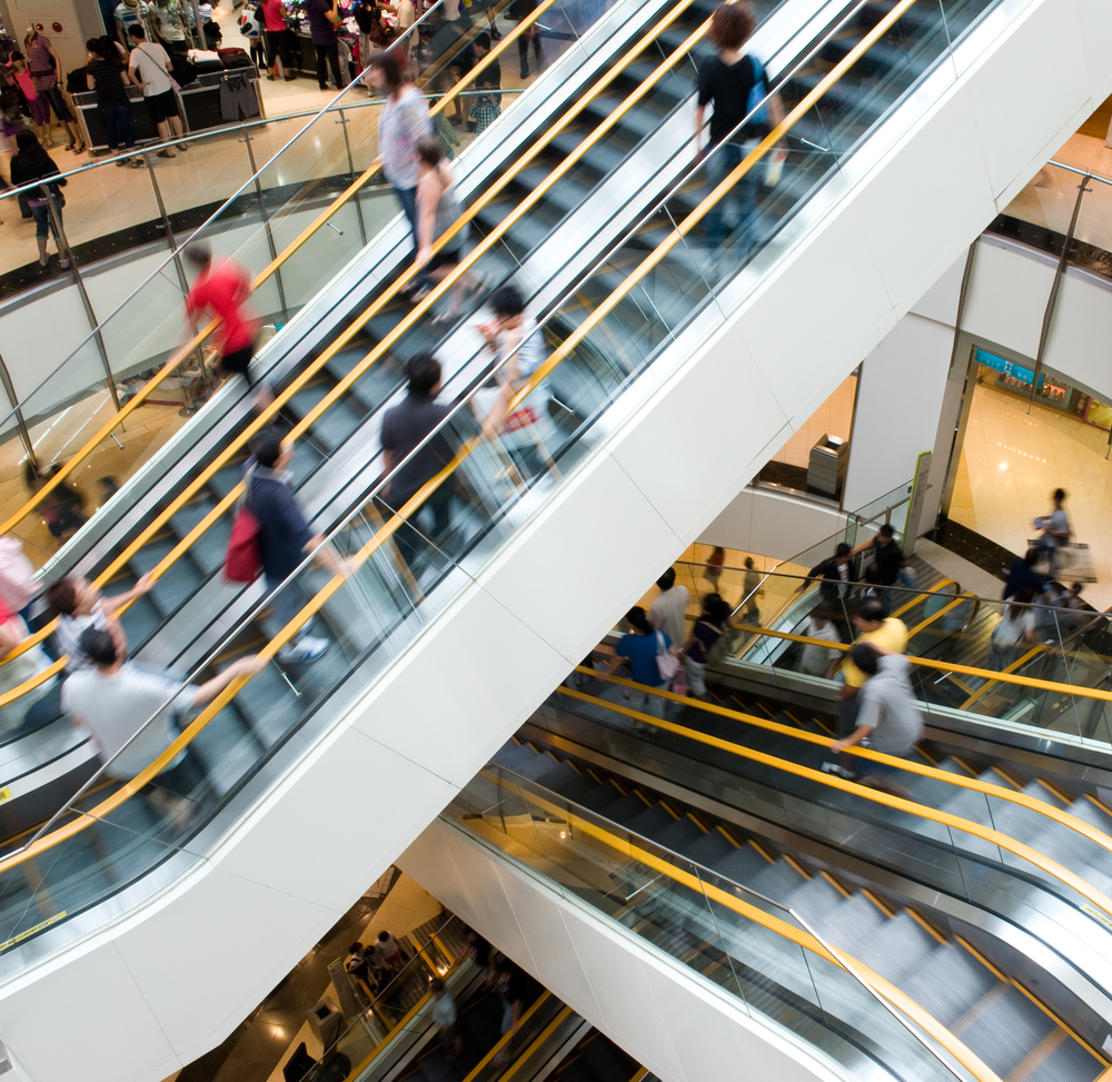 Busy escalator at shopping center