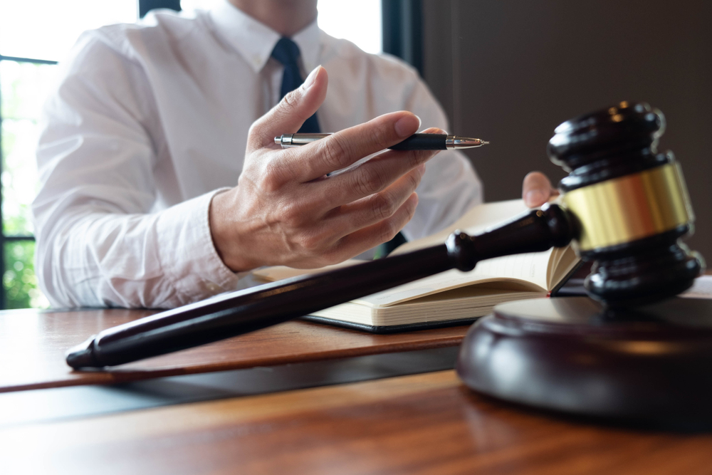 Legal expert at desk with gavel
