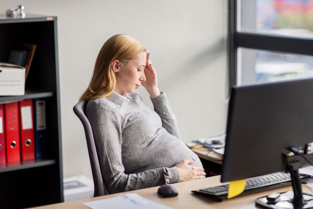 Pregnant woman looking stressed