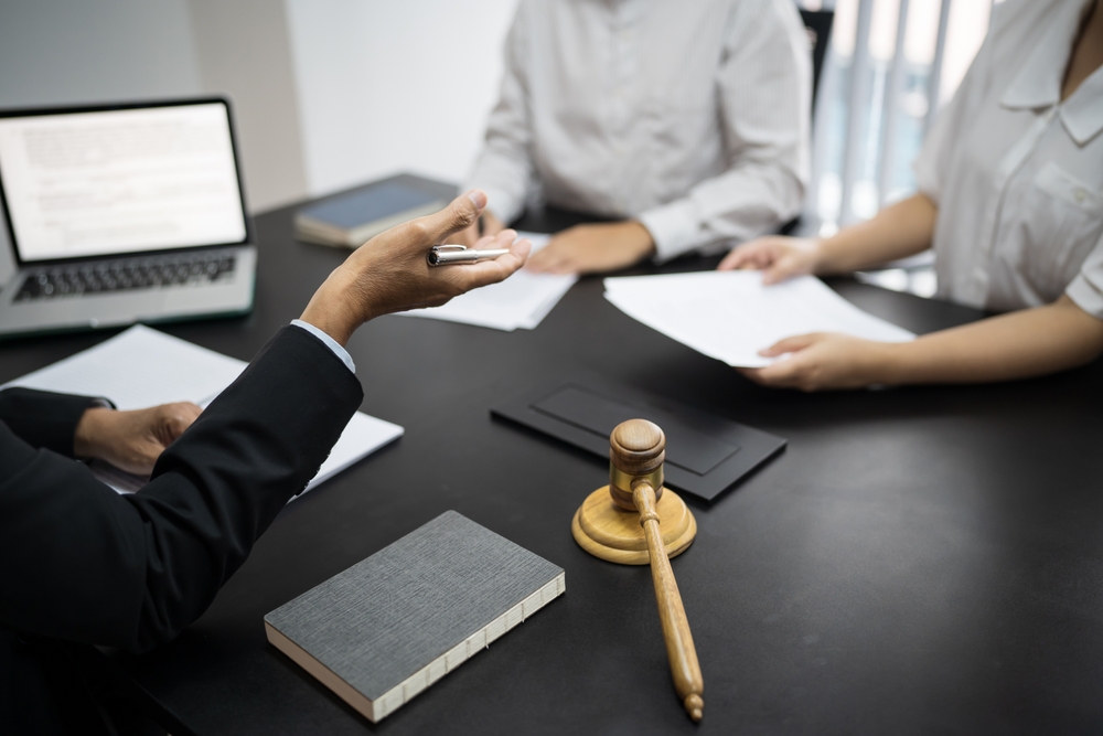 Couple discussing legal options with an attorney