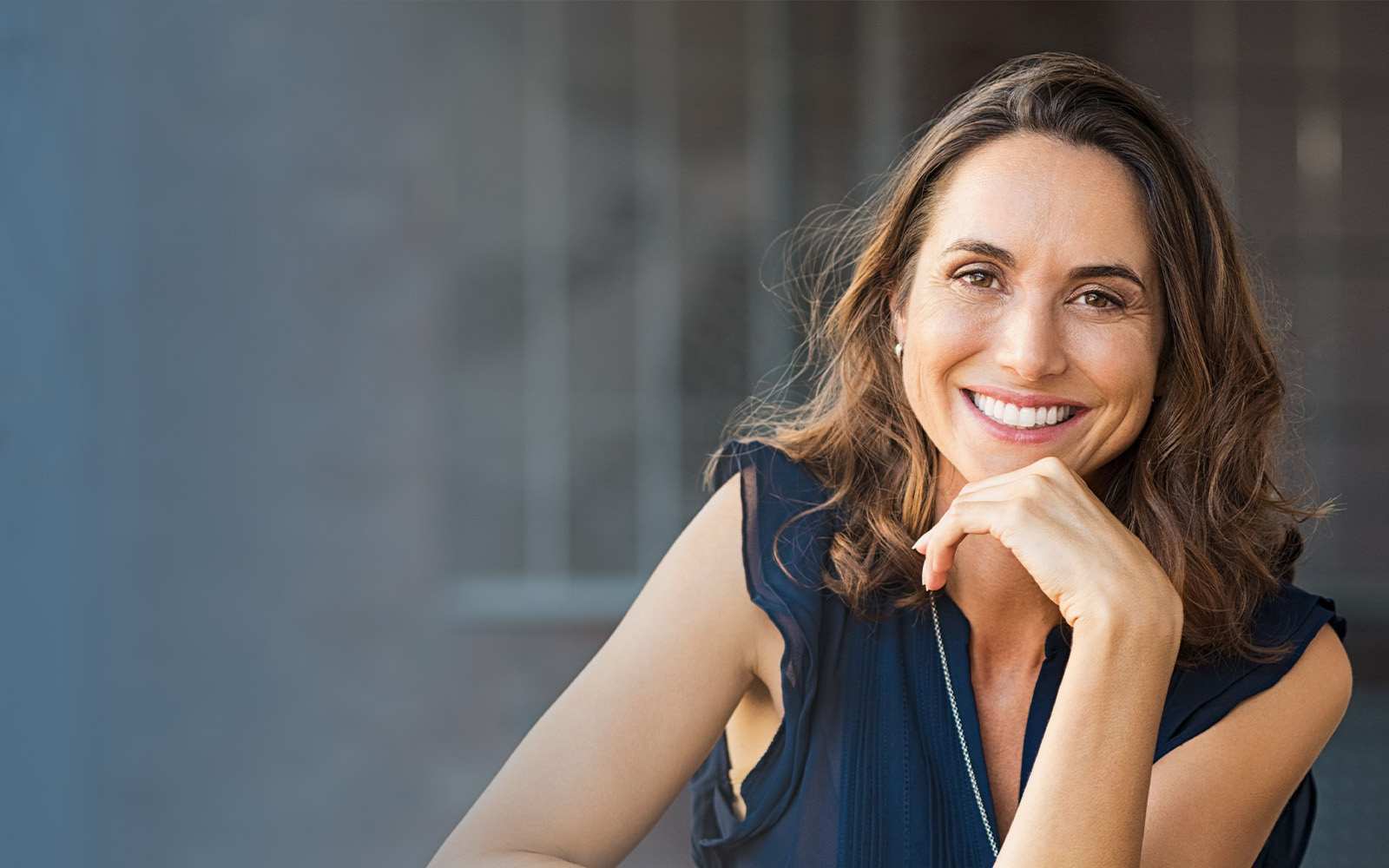 Smiling woman after gum contouring