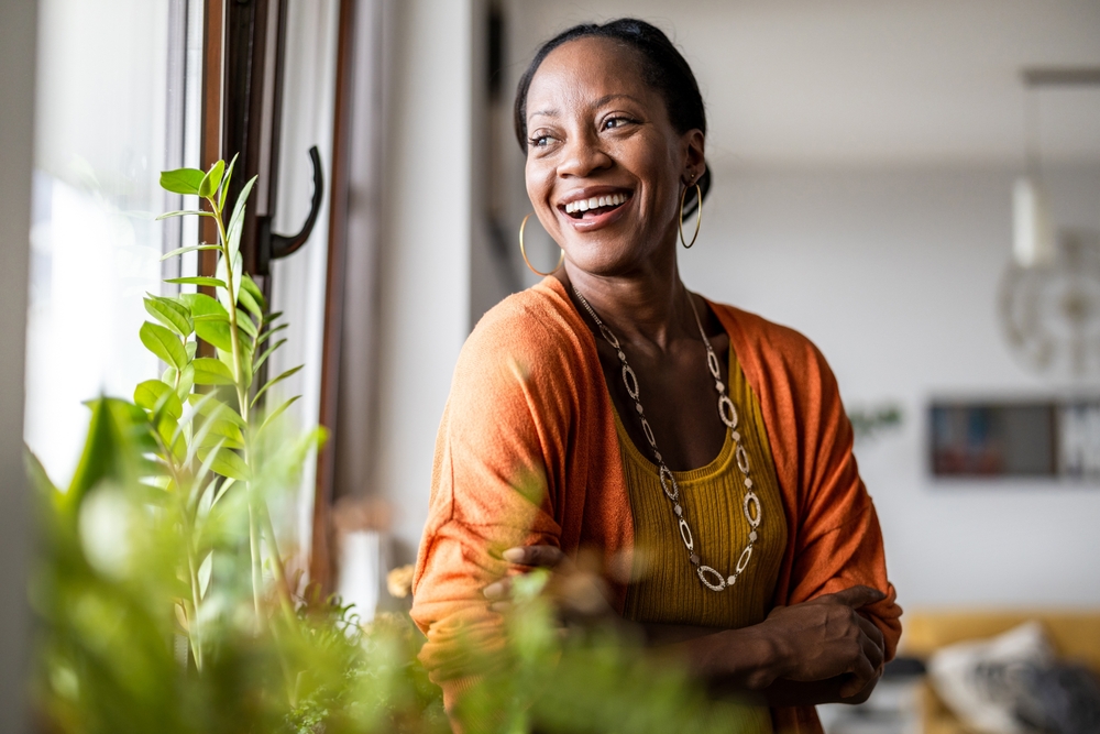 Woman smiling and relaxed after root canal treatment