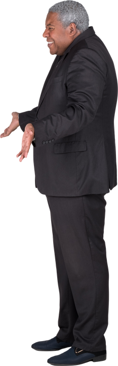 image series 363b, stanley, usa, people, person, human, individual, one person, cutout, isolated, clipped out, white background, studio shot, business, professional, formal, business professional, gray hair, grey hair, white hair, salt and pepper hair, curly hair, wavy hair, short hair, clean shaven, senior, senior citizen, grandparent, elderly, aged, old, adult, mature, man, boy, male, men, black, african american, african descent, jacket, suit coat, coat, slacks, trousers, pants, suit, dress shoes, arms down, arms to side, rear view, back, standing