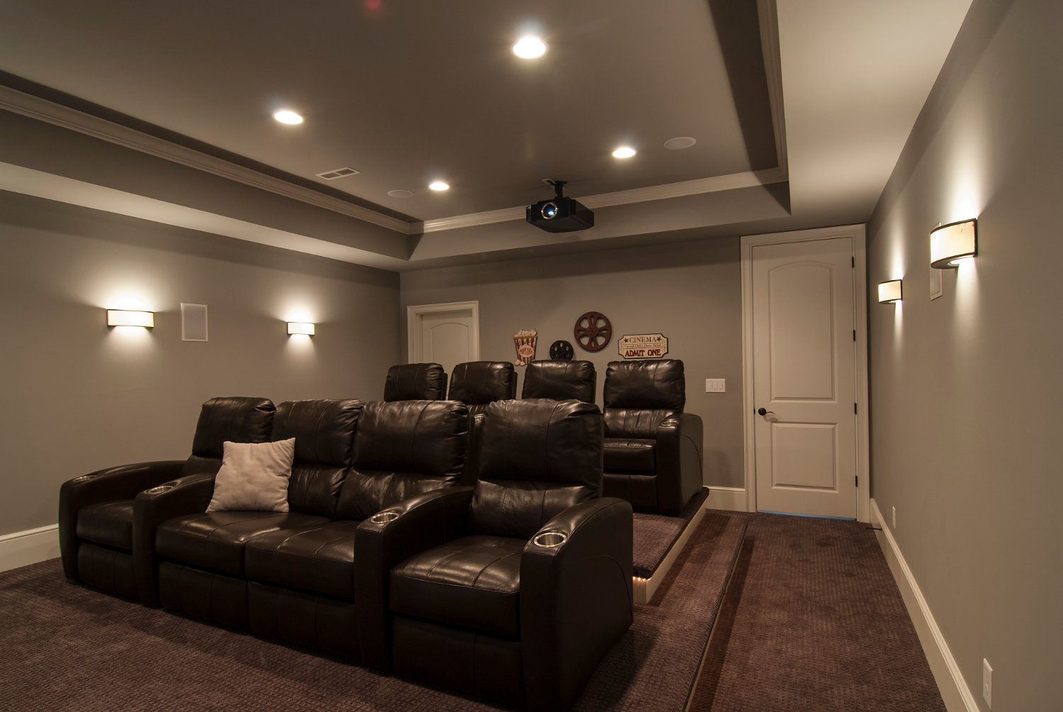 A speically constructed room at the back of the theater holds the