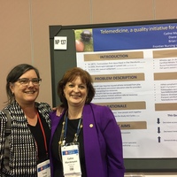 Poster Session with Tracy Klein and Cydne Markmann's poster on telemedicine tools to assess concussion