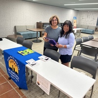 Maria and Sharon setting up 