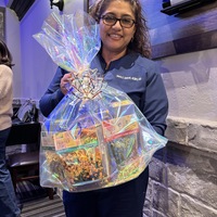 January 2025 door prize (soup basket) winner Maria Salazar 