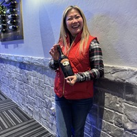 January door prize (bottle of Kahlua) winner Odette Denisa