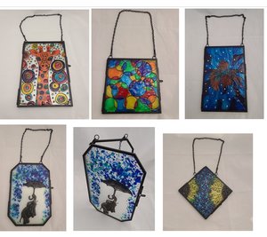Five Lockets with one shown open by Sandy Thapsem