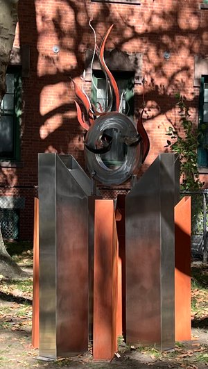 Rutkowski_(prophecy of) Sacred Fire_ 2025_ Rusted steel and stainless steel with   pigment coloratio by Janet Rutkowski (2025)