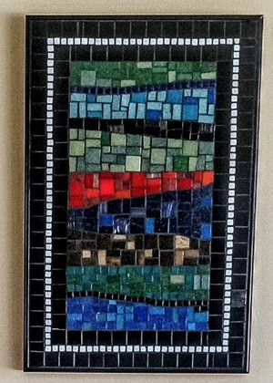 Multi color mosaic wall hanging,featuring a black and white border design in glazed and porcelain ce by anita garrison (2025)