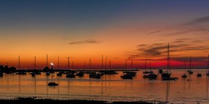 Sunrise Over Scituate Harbor by Bart Blumberg