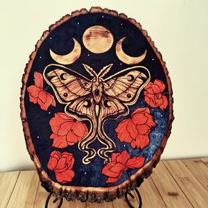 Janhavifirke_ lunar bloom _ pyrography _ 15x11_275 by Janhavi Firke (2025)