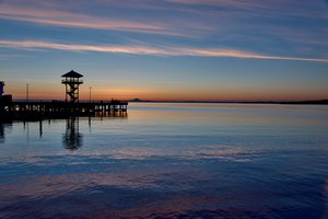 Ship Hiding Behind Pier by James Rost