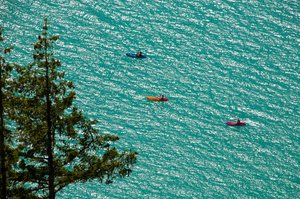 Three Kayakers by Matthew Spencer