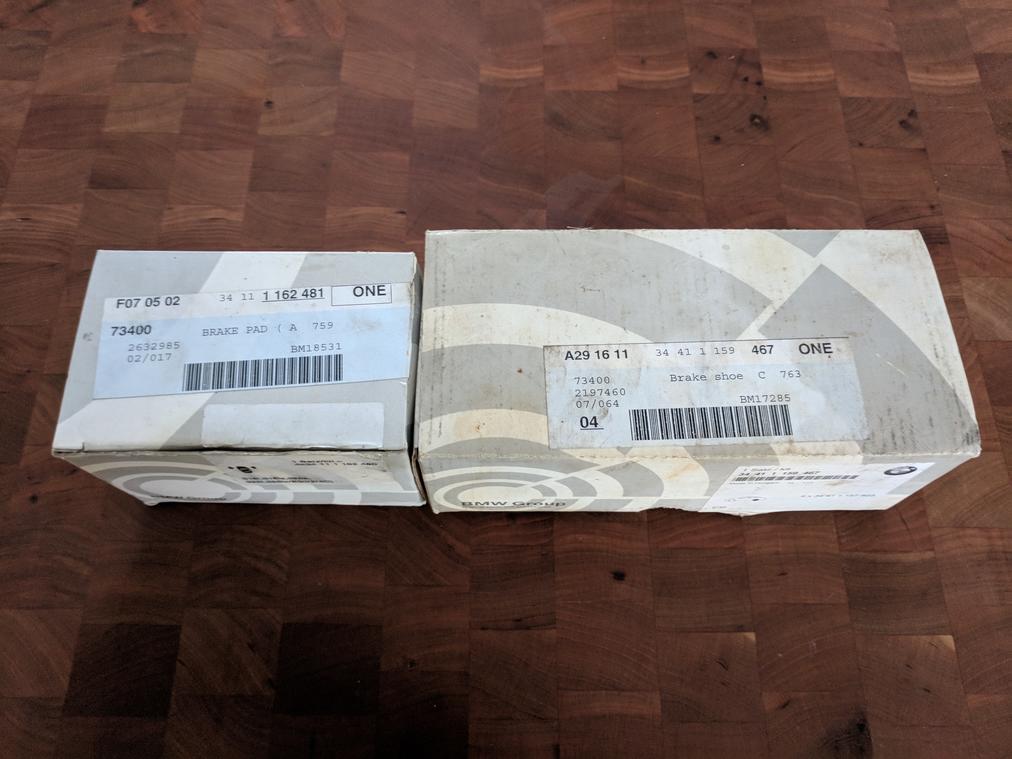 E30 NOS BMW E30 OEM front brake pads, parking brake shoes
