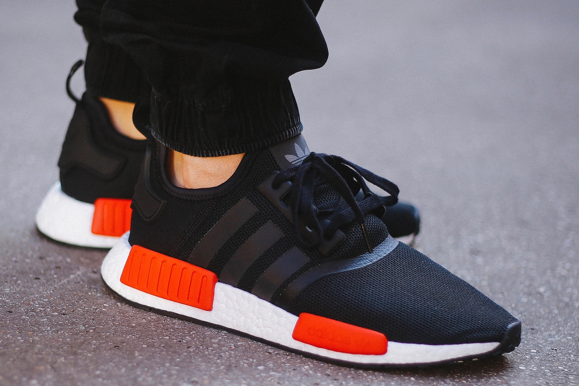 adidas nmd black and red on feet