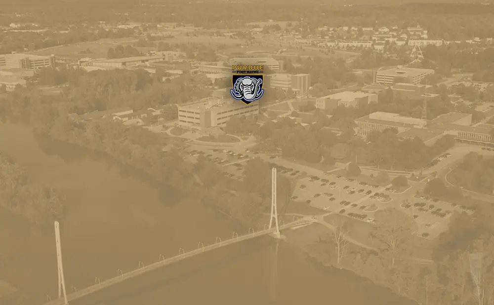 Aerial view of Purdue Fort Wayne campus with a logo of an elephant wearing a helmet.