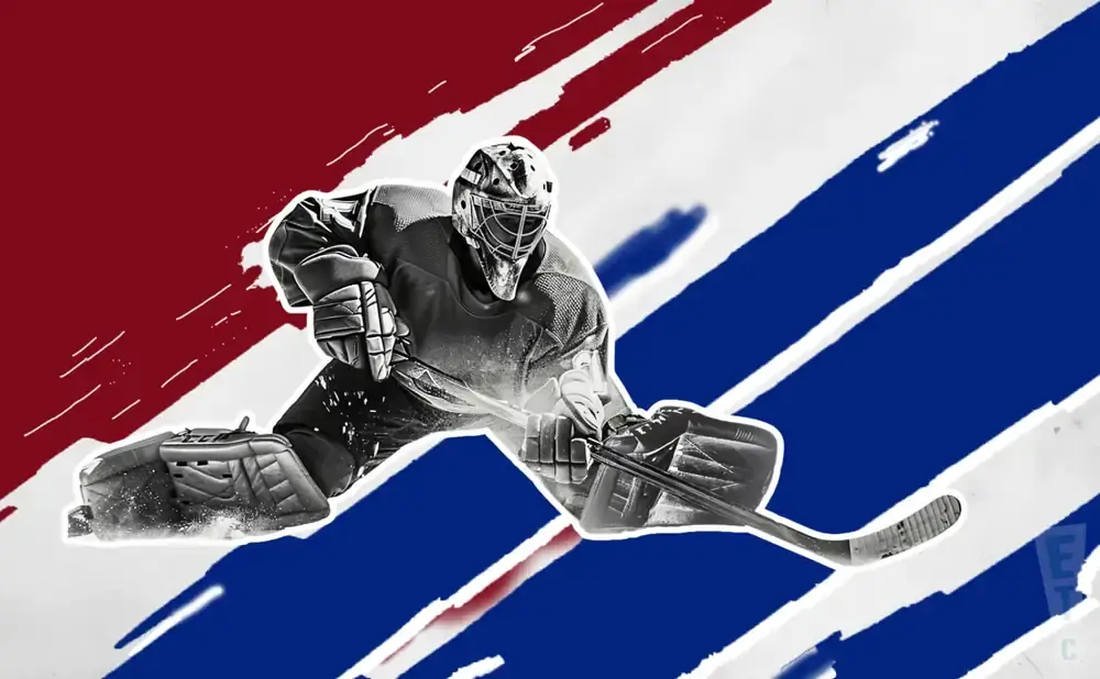 Hockey goalie in pads and mask in a split-color background of red, white, and blue stripes.