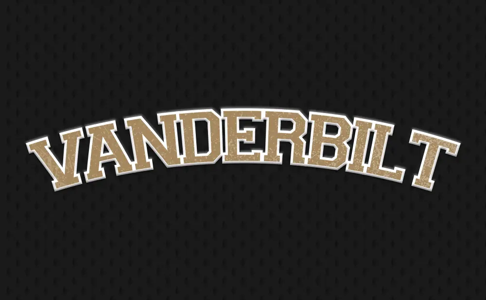 Vanderbilt text in a distressed, tan font with a white outline on a black, textured background.