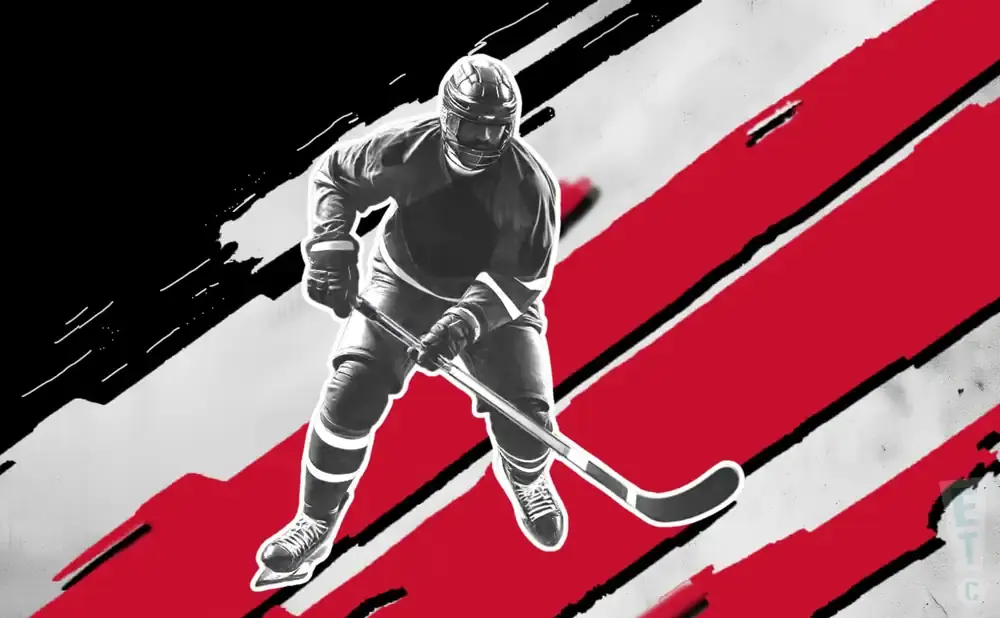 A hockey player in black and white, in action, with red and black abstract background.