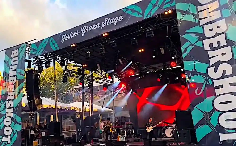 A band performs on a stage at the Bumbershoot festival.
