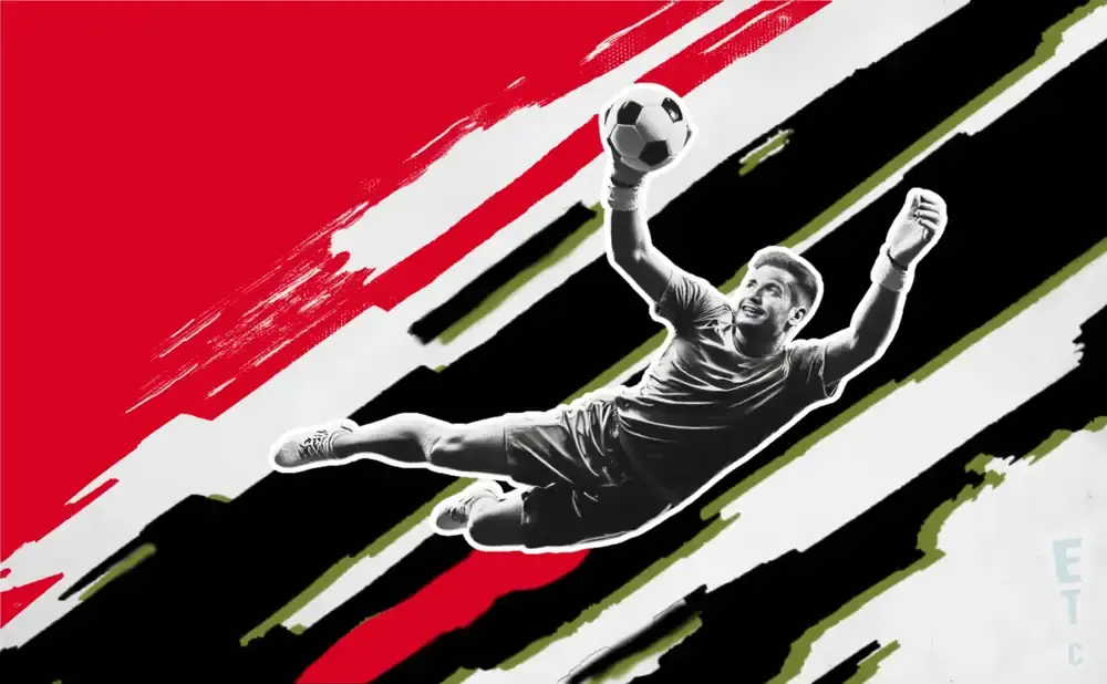 Soccer goalkeeper diving to catch the ball against a dynamic red, black, and white background.