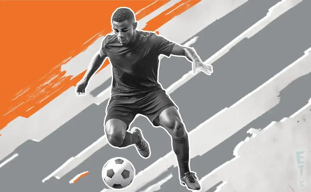 A soccer player in mid-stride, dribbling a ball against an abstract orange and gray background.