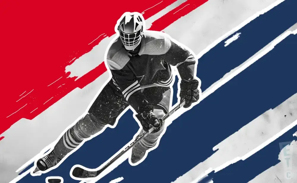 A black and white hockey goalie in action against a red, white, and blue background.