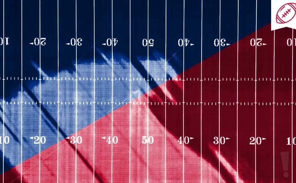 American football field with red and blue zones and yard markers.