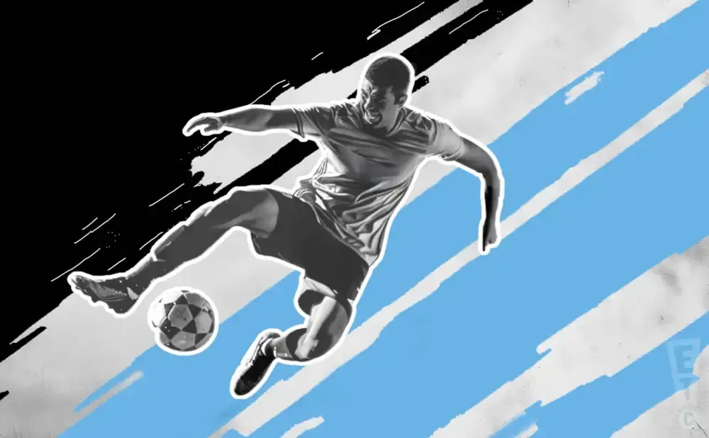 A soccer player in mid-air kicks a ball with a black and blue background.