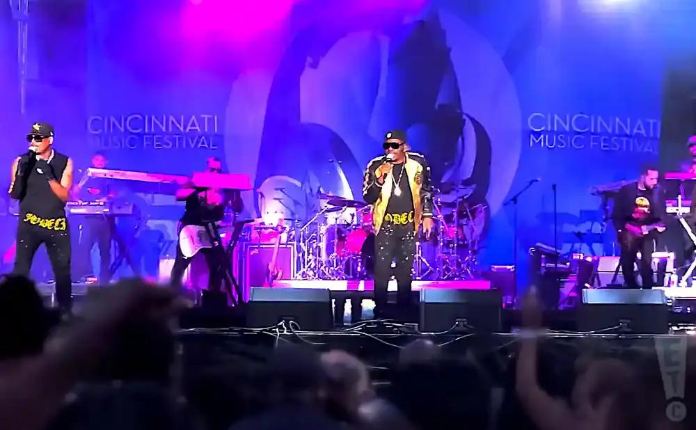 A band performs on a stage with 