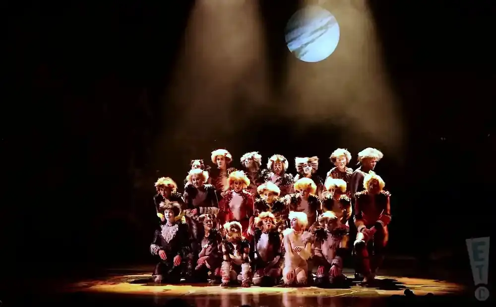 A cast of performers in 