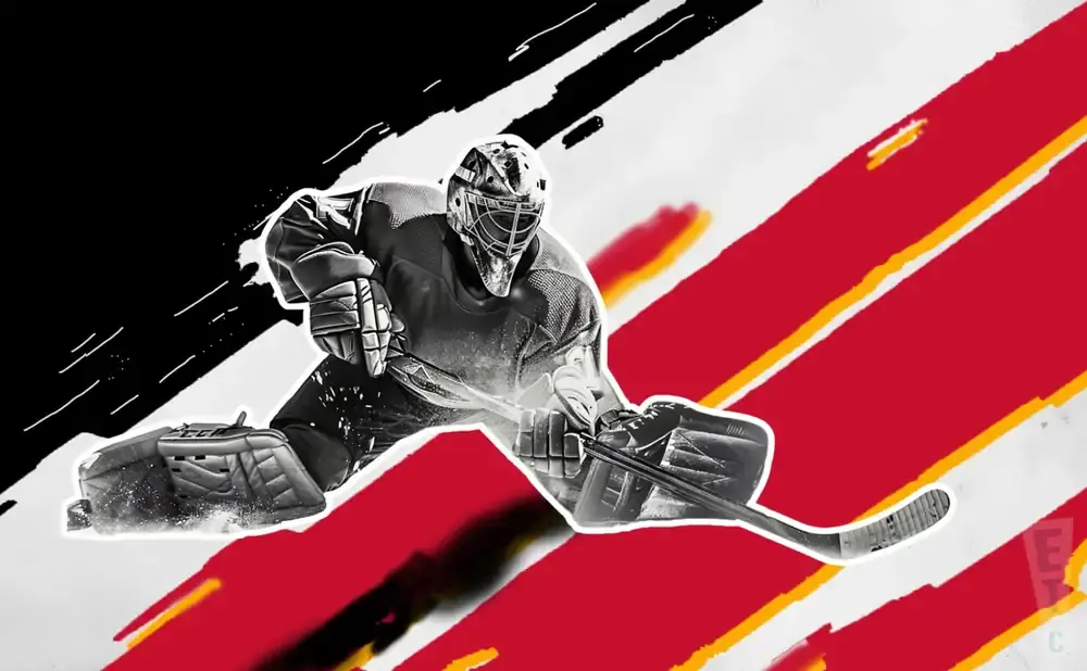 A hockey goalie in a crouched position, with a black and red background.