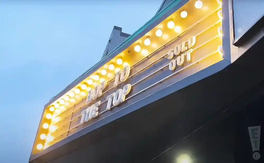 A marquee sign reads 