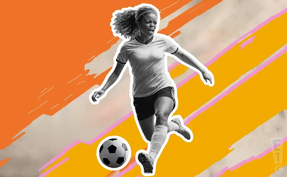 A Black woman in a soccer uniform dribbles a ball with a colorful, abstract background.