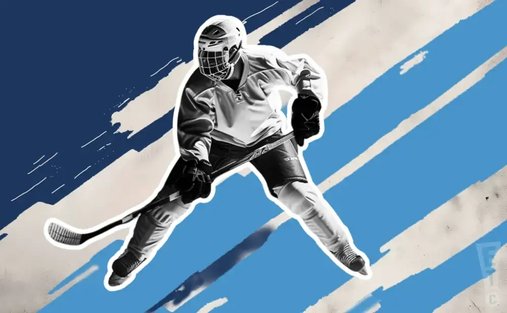 A hockey player in full gear skates forward, stick in hand, against a blue and white striped background.