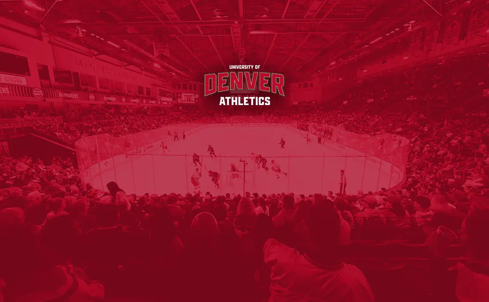 University of Denver Pioneers hockey game in a crowded arena.