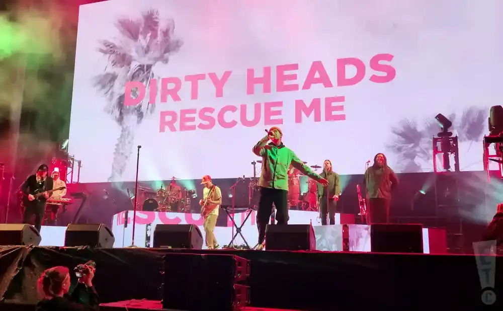 A band performs on stage with 