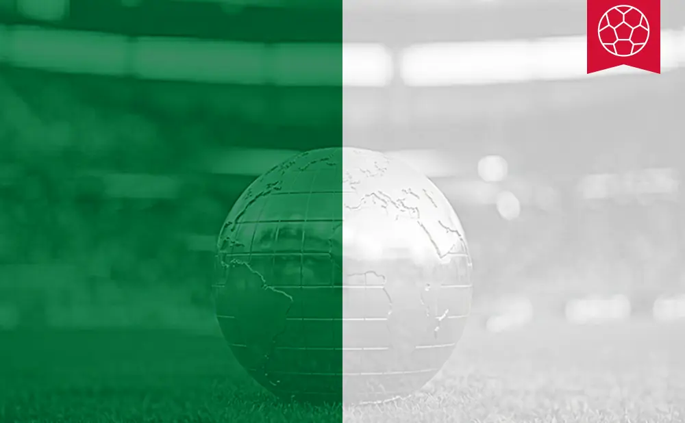 A globe on a soccer field, split in half with green on the left and grayscale on the right.