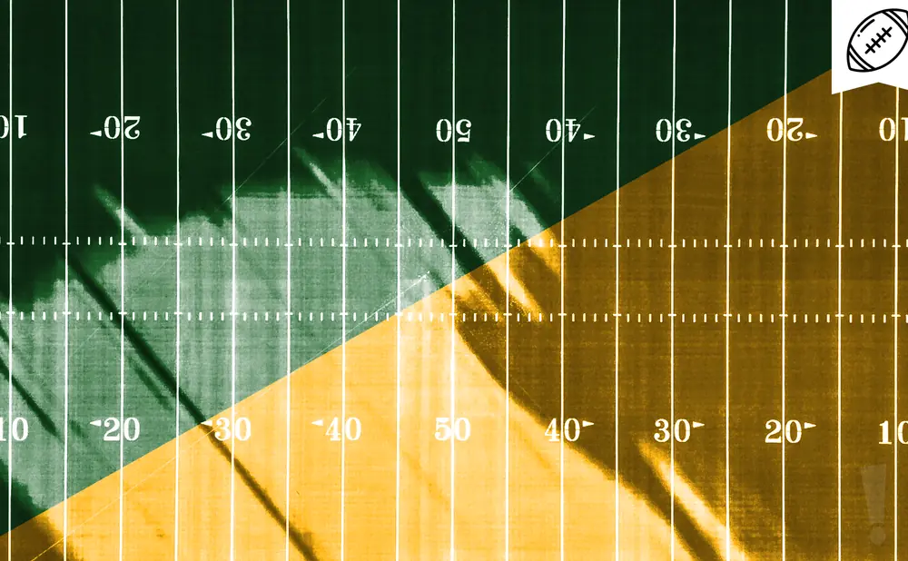 American football field, half green and half gold, with yard markers and a football emblem.