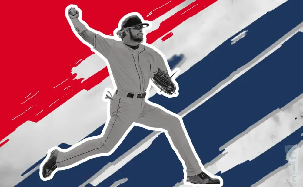 A baseball pitcher in a grey uniform throws a pitch against a red, white, and blue striped background.