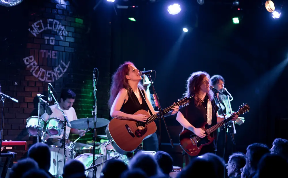 Band performing on stage at The Brudenell Social Club.