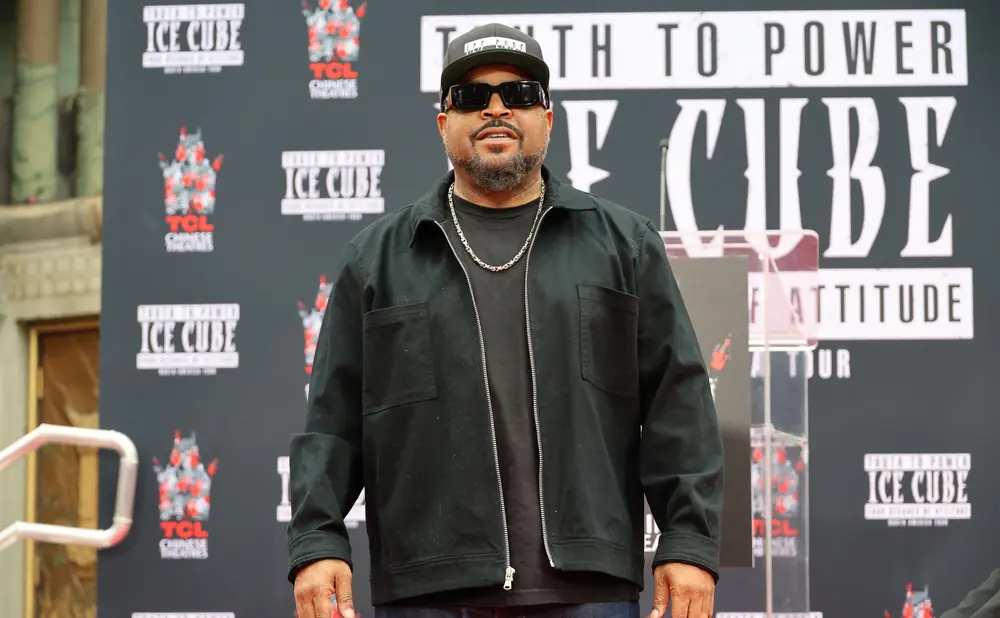 Rapper Ice Cube poses at his handprint ceremony at TCL Chinese Theatre.