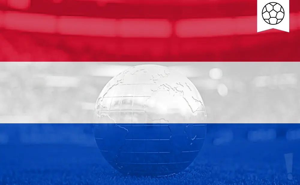 A glass globe sits on grass, superimposed on the Dutch flag, with a soccer ball icon in the top right.