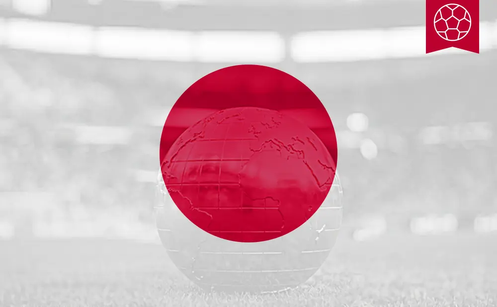 A globe with the Japanese flag overlayed, set against a blurred stadium background.